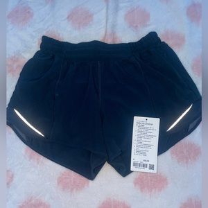 True Navy Lululemon Hotty Hot 4 inch shorts in size 6